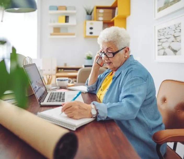 Older woman working on computer